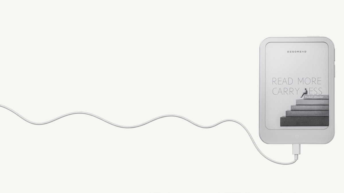 E-reader connected to a USB-C charging cable.